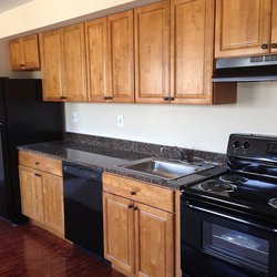 wooded kitchen at The Courts has two great locations featuring newly renovated apartment homes. Minutes to downtown DC