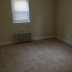 carpeted bedroom at The Courts has two great locations featuring newly renovated apartment homes. Minutes to downtown DC